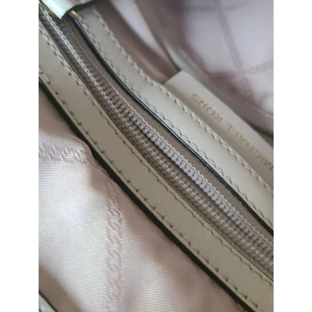 Michael Kors Pebbled Leather Backpack in Light Cream with Gold Hardware